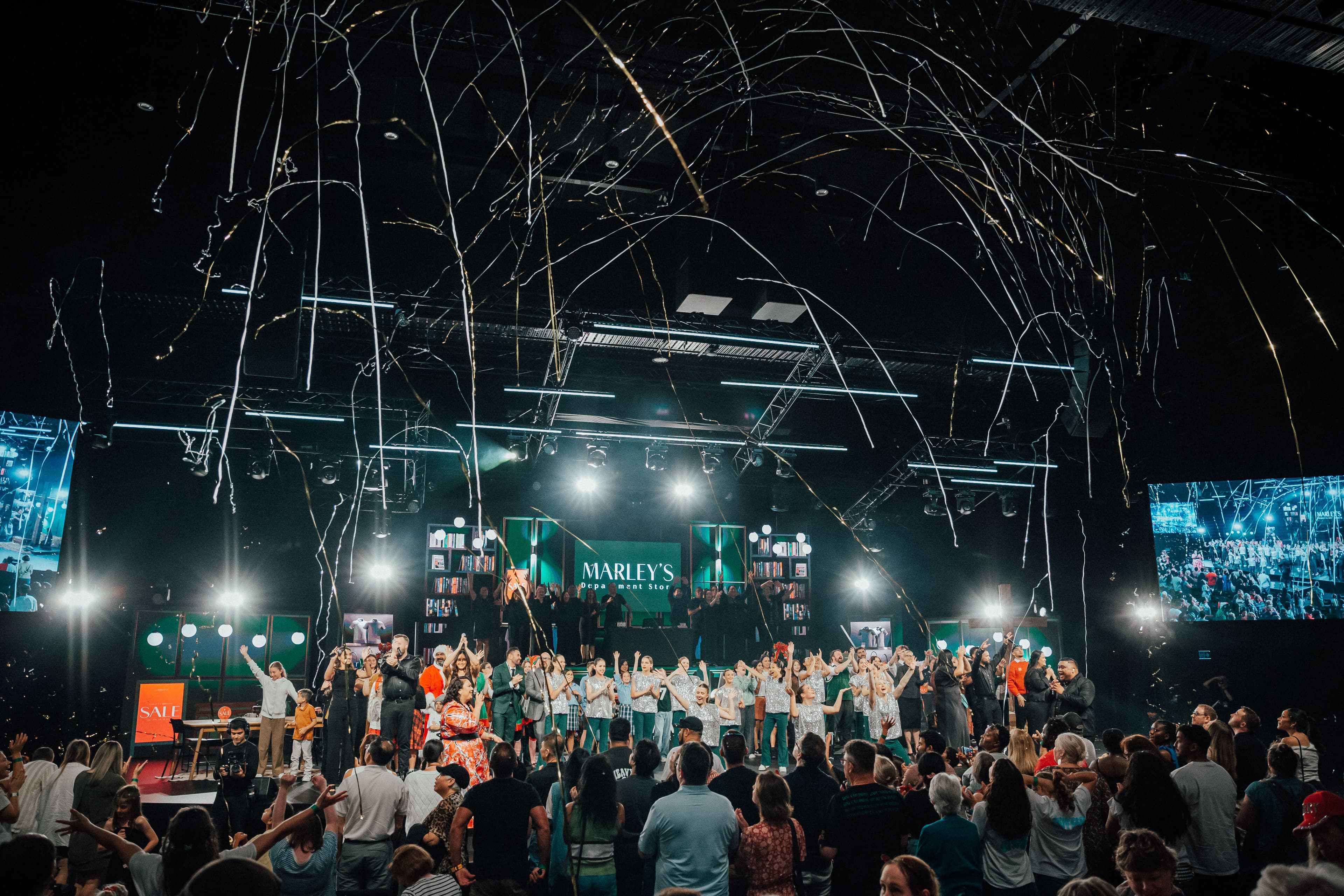 Crowd shot with streamers coming from ceiling in finale of Christmas Spec 2024