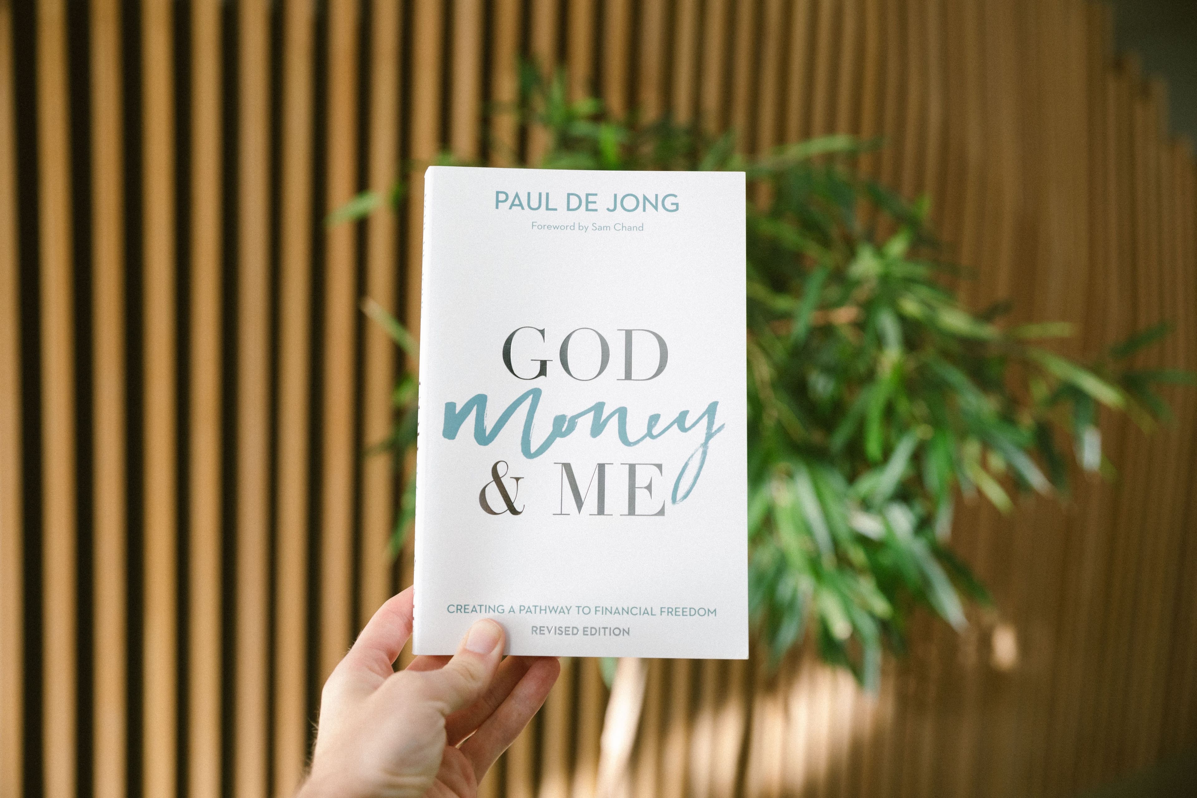 God Money & Me book with tree and wood panelling behind