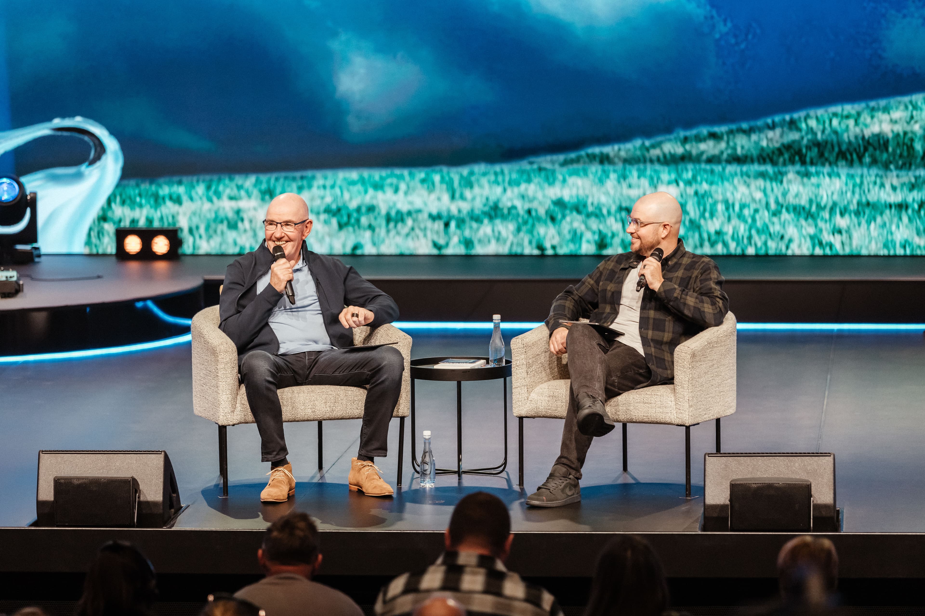Ps Paul and Ps Luke on chairs on stage during Common Cents series