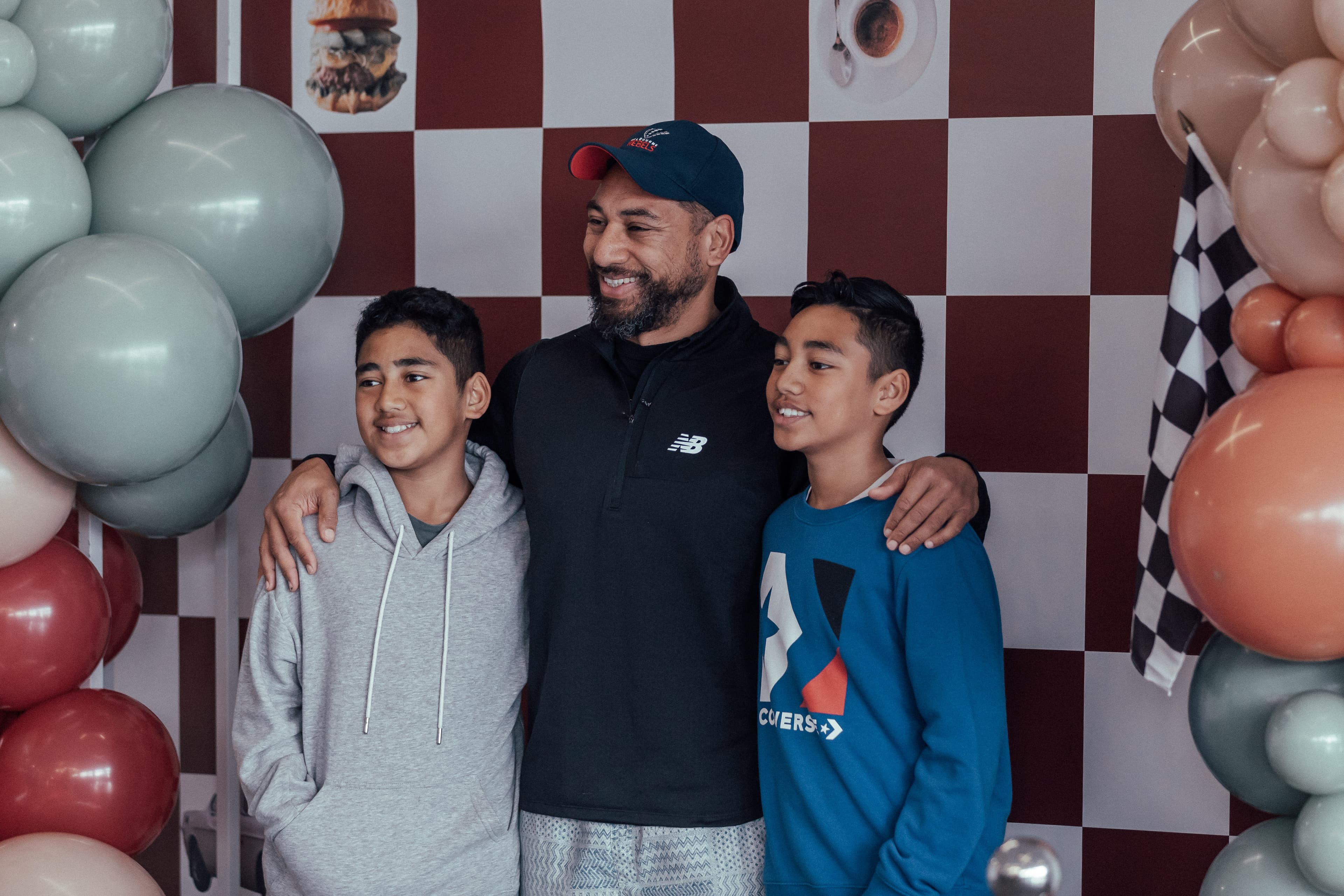 Dad and kids posing for photo during Fathers Day 