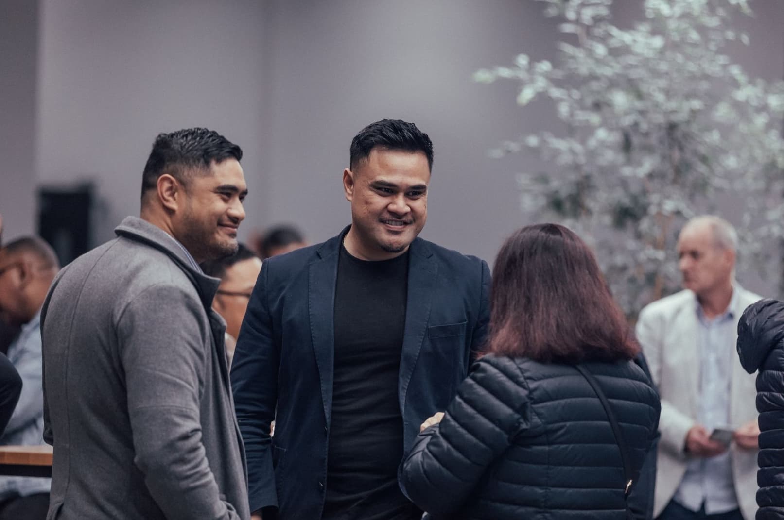 People talking in the foyer at LIFE Central after a LIFE Business event