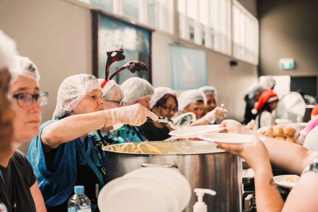 People serving in the Kitchen for LIFE Community