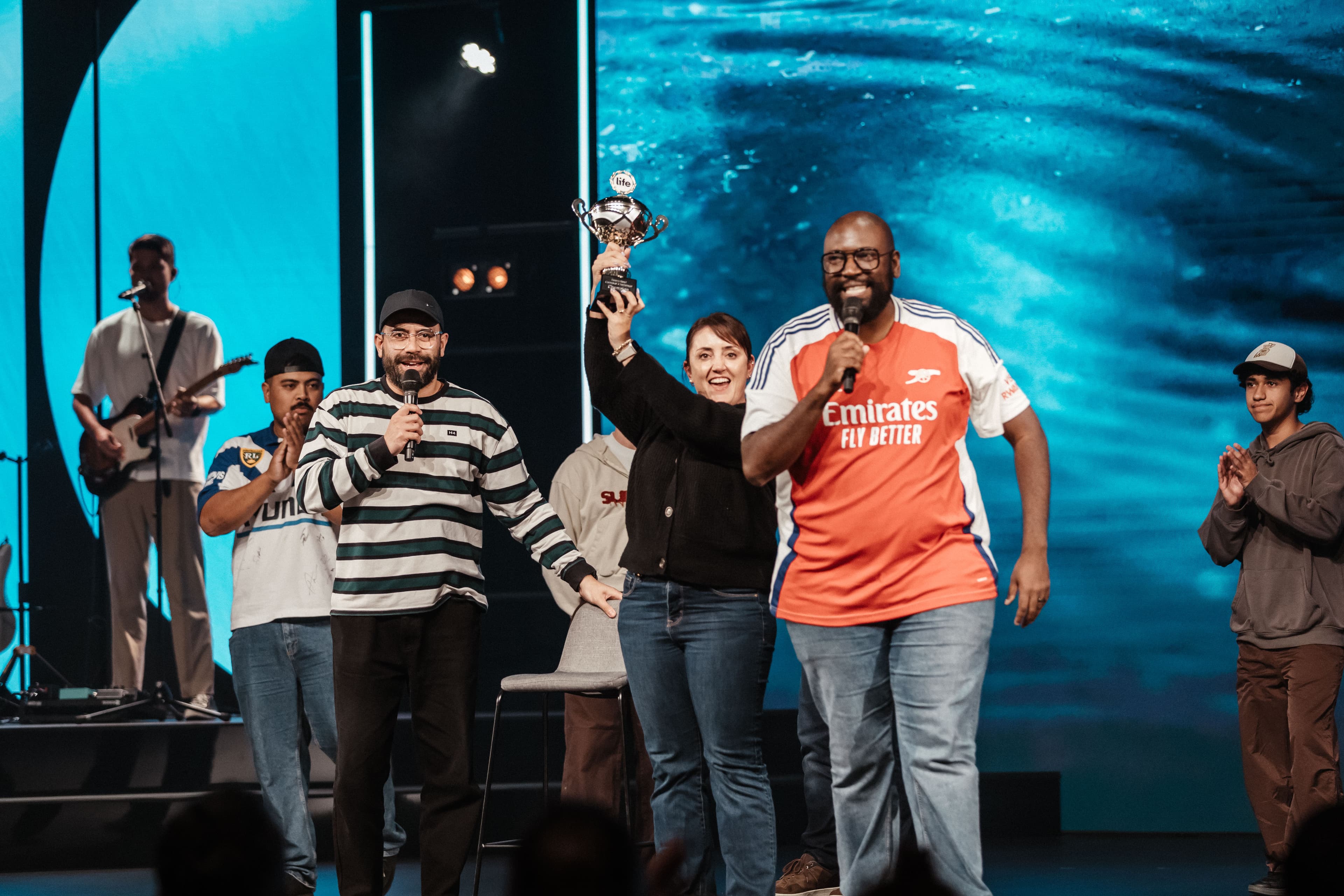 Campus Cup winner holding a trophy